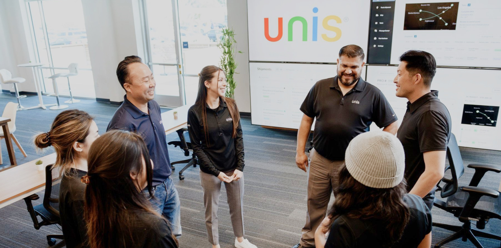 Unis team members in an office setting